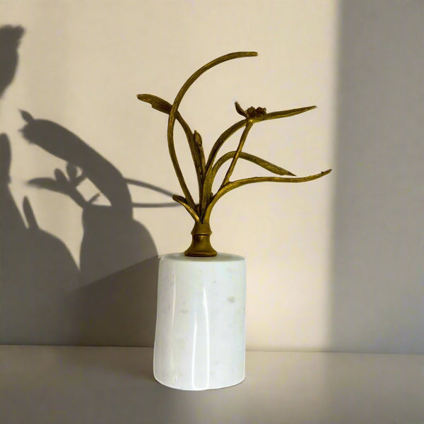 Metal gold tree with marble base