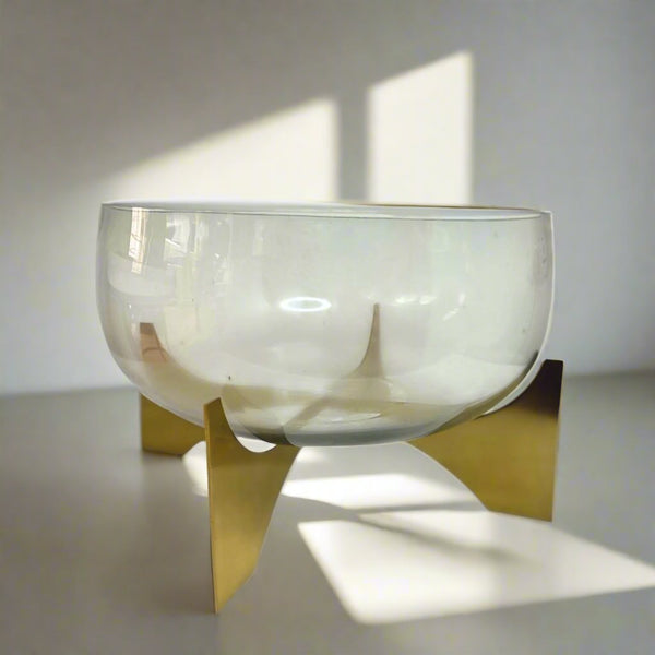 Glass vase on metal stand