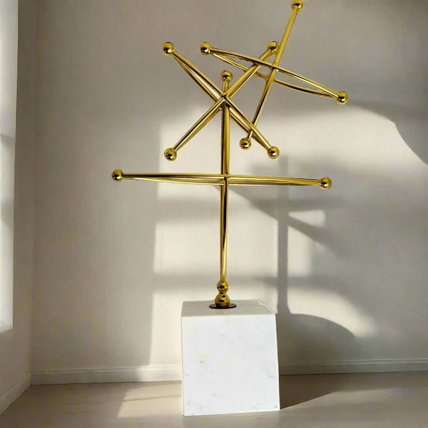 Gold ornament with marble base