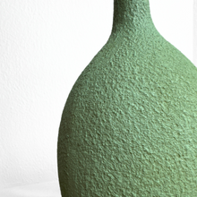 Green vase with long neck