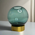 Blue glass vase on gold stand – view 2