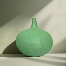 Green vase with long neck