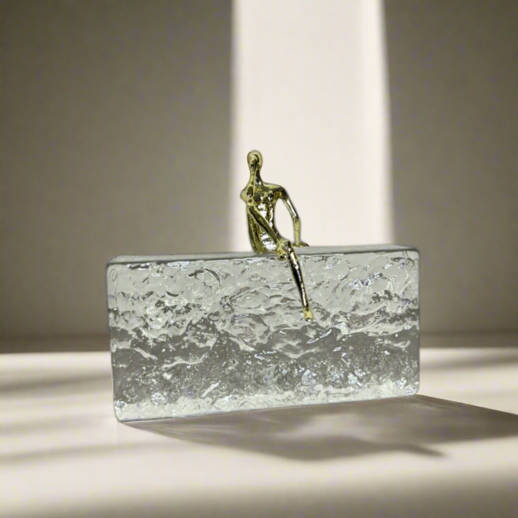 Crystal ornament with gold man