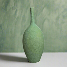 Green vase with long neck