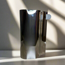 Steel vase with leather tag