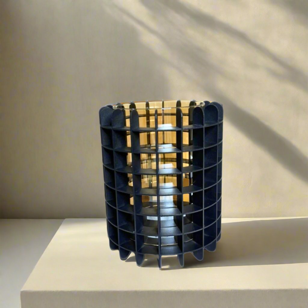 Gold vase in black metal casing – view 2