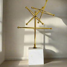 Gold ornament with marble base