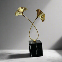 Metal flower with marble base