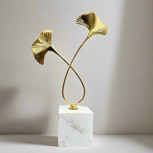 Metal flower with marble base