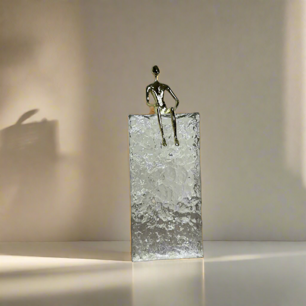 Crystal block with gold sitting man – view 2