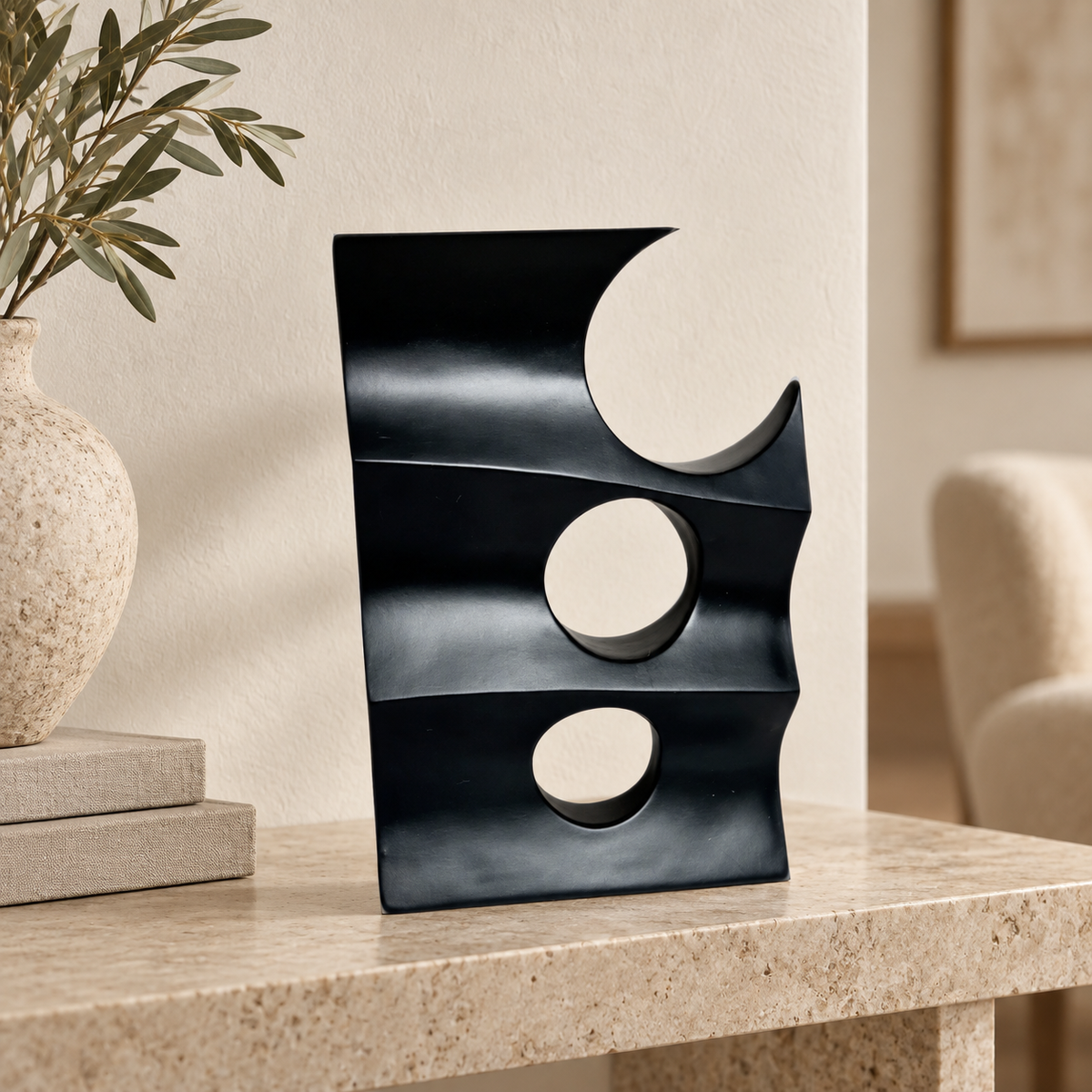 Black decoration piece with holes — lifestyle