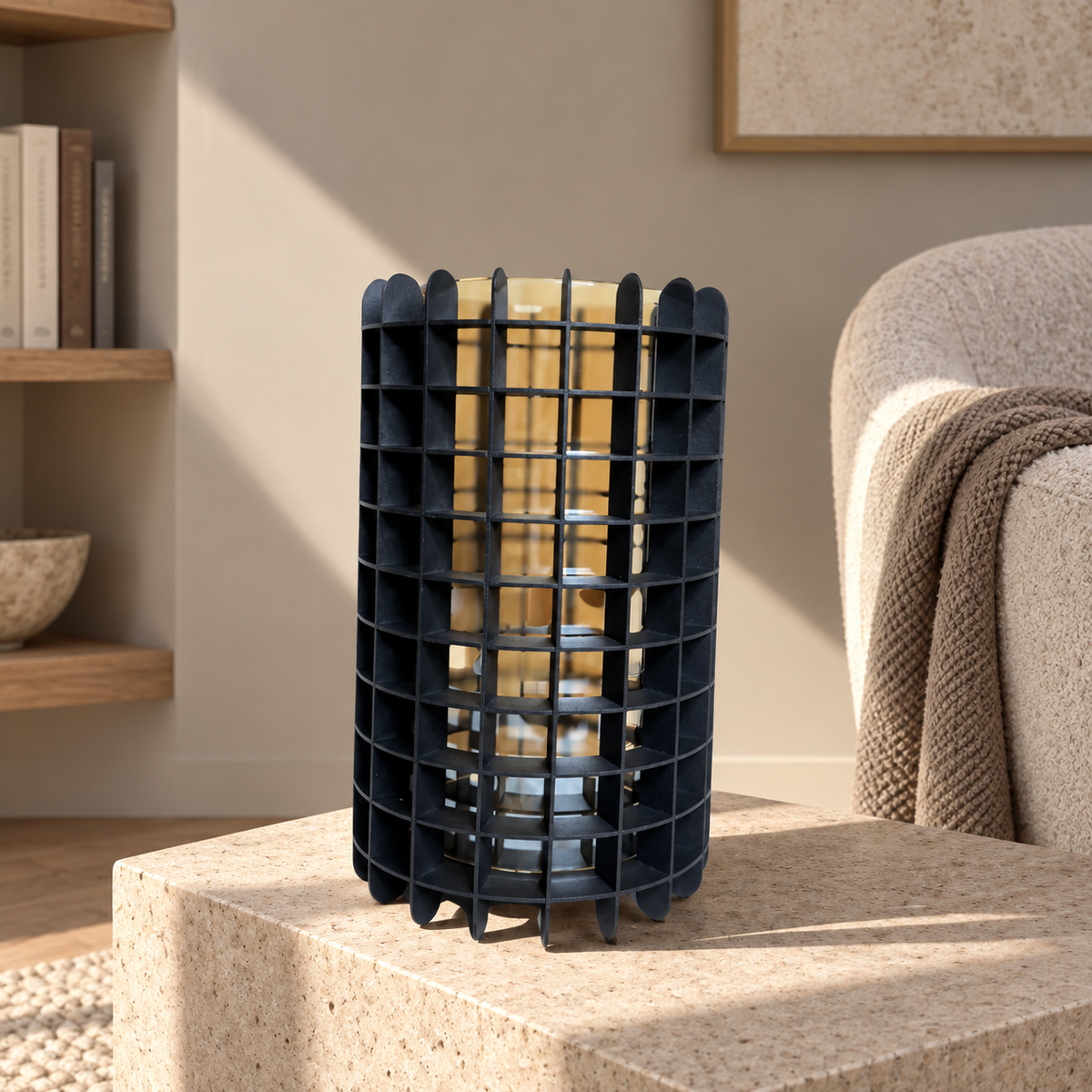Gold vase in black metal casing — lifestyle
