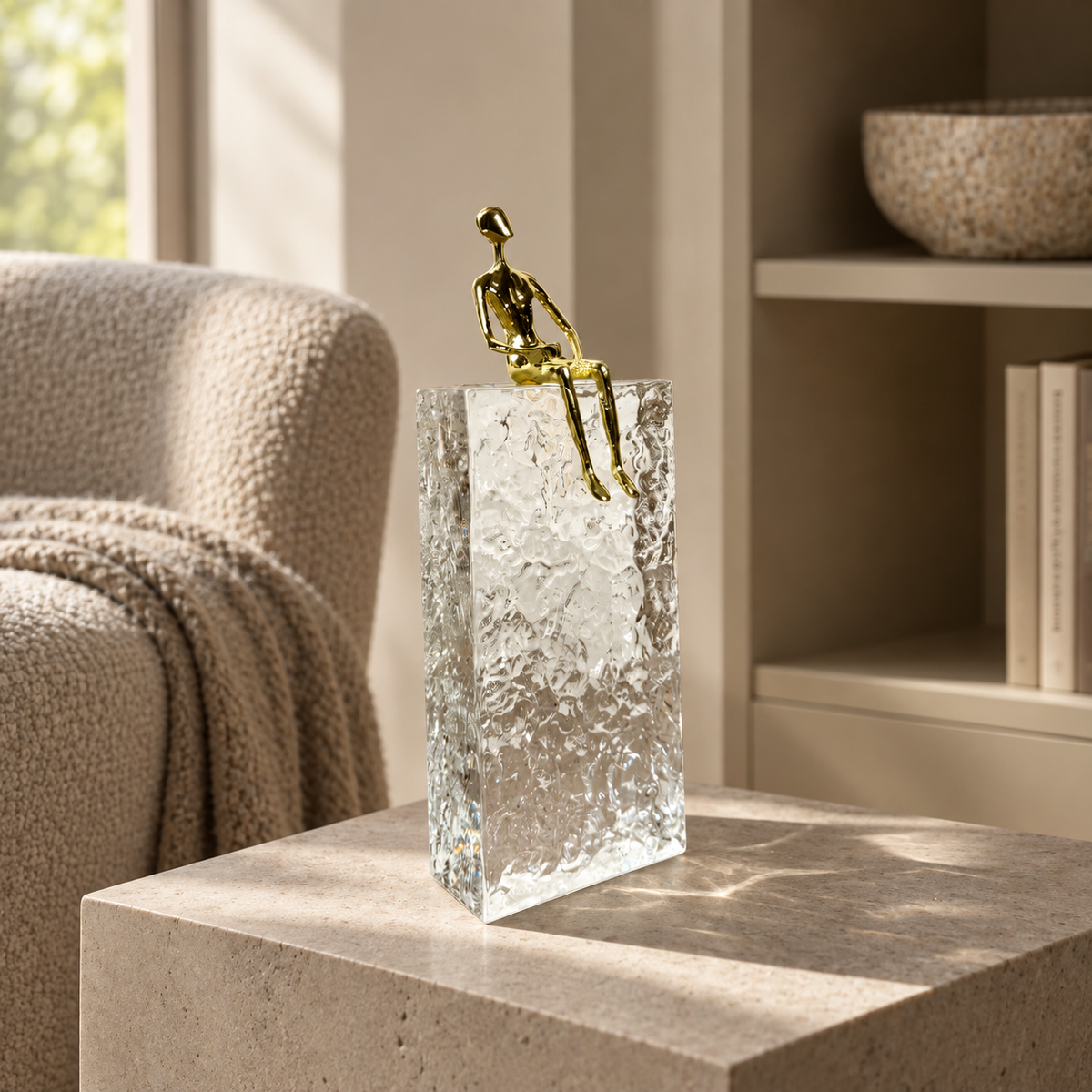 Crystal block with gold sitting man — lifestyle