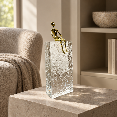 Crystal block with gold sitting man — lifestyle