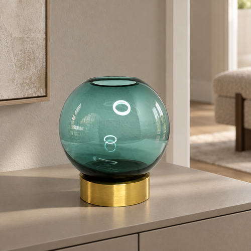 Blue glass vase on gold stand — lifestyle