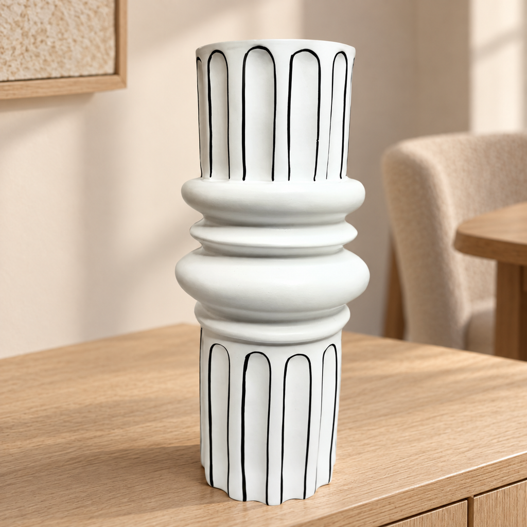 White vase with black accents — lifestyle